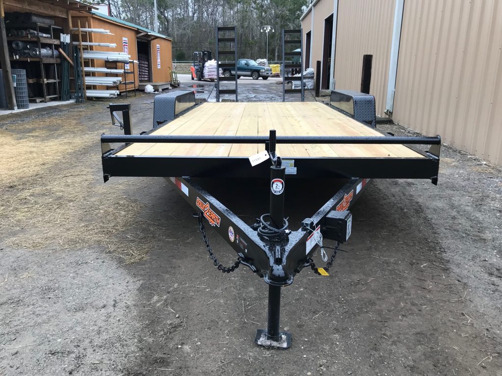 Down 2 Earth 82x18 Equipment Trailer with 2-3500lb axles, treated 2x8 flooring, A-frame jack, 5-foot ramps, 2-foot dovetail, LED lights, and NATM compliant.