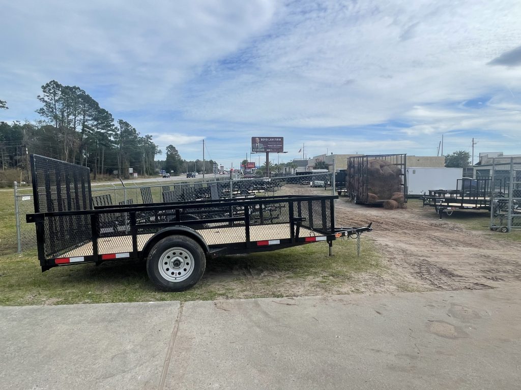 Down 2 Earth 76x12 utility trailer with mesh sides, 3500lb Dexter axle, treated 2x8 flooring, fold-up jack
