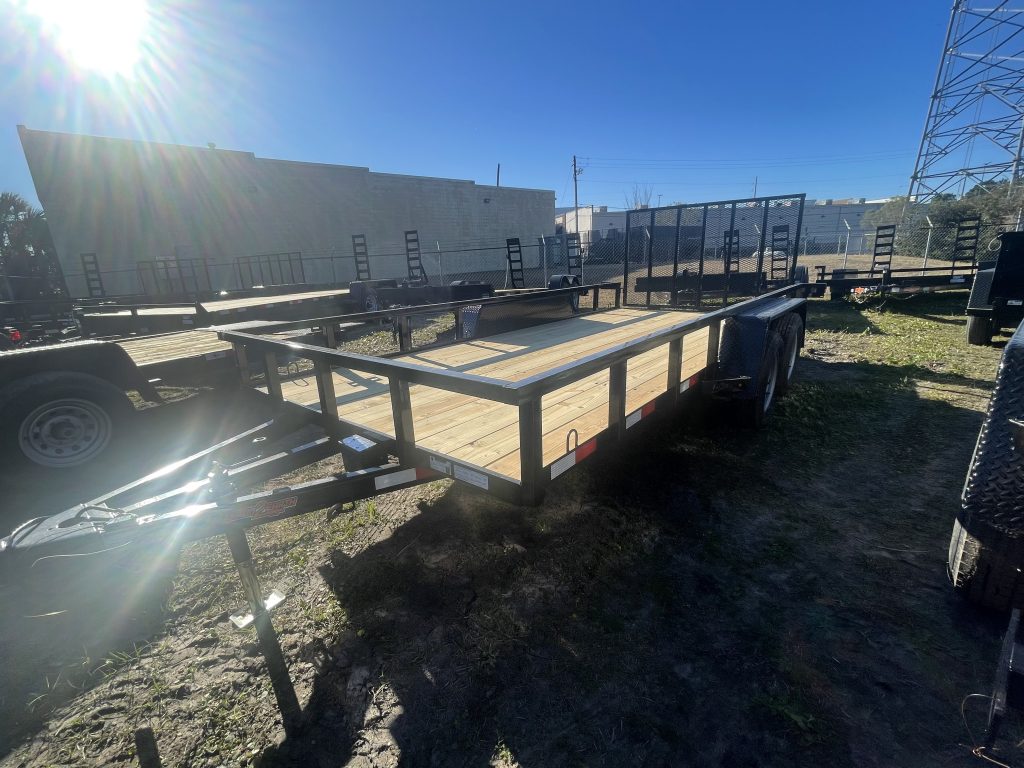 Down 2 Earth 82x16 Utility Trailer with 2-3500lb axles, 15-inch wheels, fold-up jack, treated 2x8 flooring, 48-inch gate, and smooth fenders.